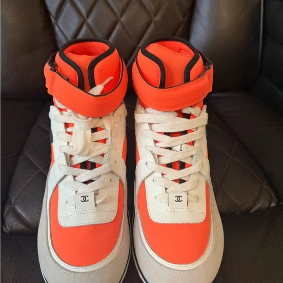 CHANEL Vibrant Orange and Cream Sneakers